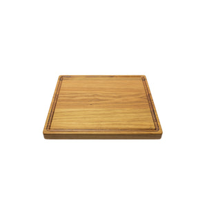 Medium sized handmade cutting board, in white oak, hand finished, with a juice channel feature. Made in the USA.