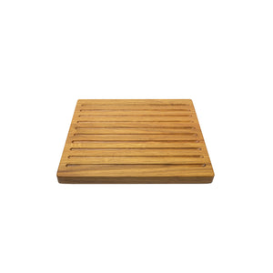 Medium sized handmade cutting board, in white oak, hand finished, with a carved, long recessed channels feature for breads. Made in the USA.