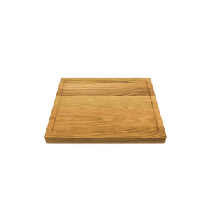 Medium sized handmade cutting board, in white oak, hand finished, with a carved, recessed face feature for juicy foods. Made in the USA.